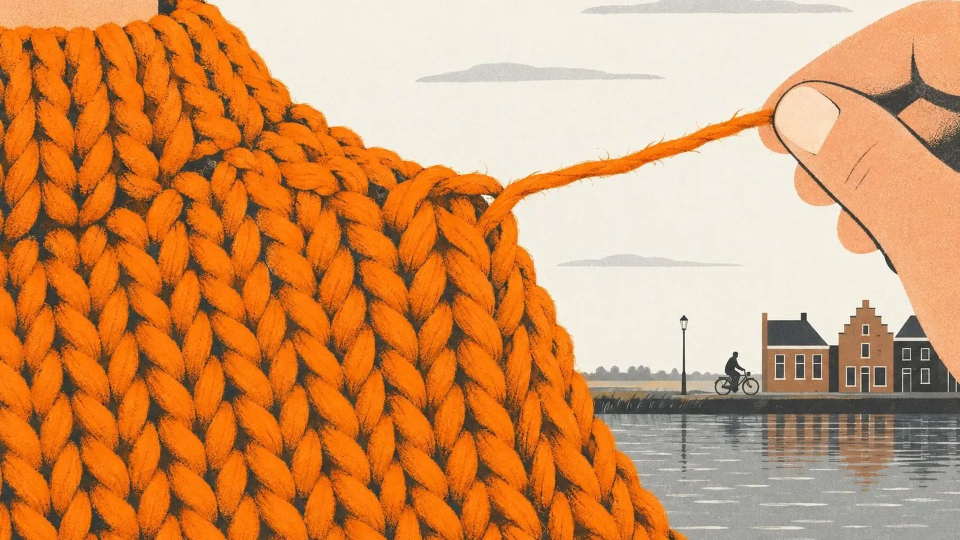 Een extreme close-up van de grof gebreide structuur van een wollen trui, strak gespannen, met één losse draad die net iets van de stof af staat.